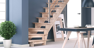 Escada moderna com linhas elegantes e materiais contemporâneos, realçando a estética minimalista.